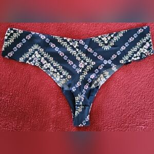 Victoria's Secret Navy thong panty w/ lace size Medium never worn. Too Small.